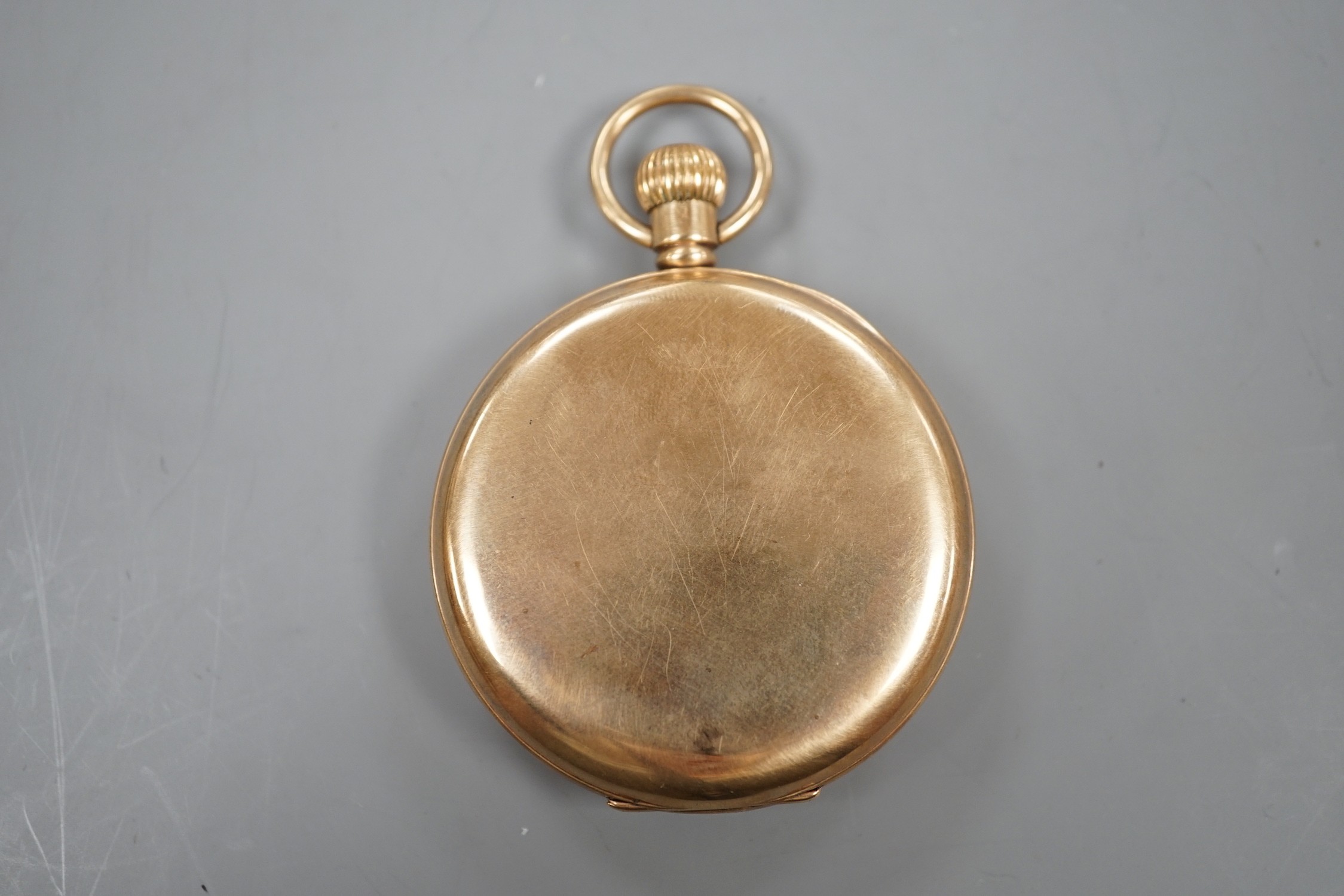 A George V 9ct gold open faced gold pocket watch with Roman dial and subsidiary seconds, the inner case with engraved inscription, case diameter 47mm, gross weight 76.9 grams, in fitted case.